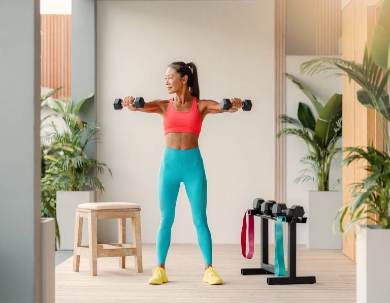 A fit woman in her 50s doing a strength training
